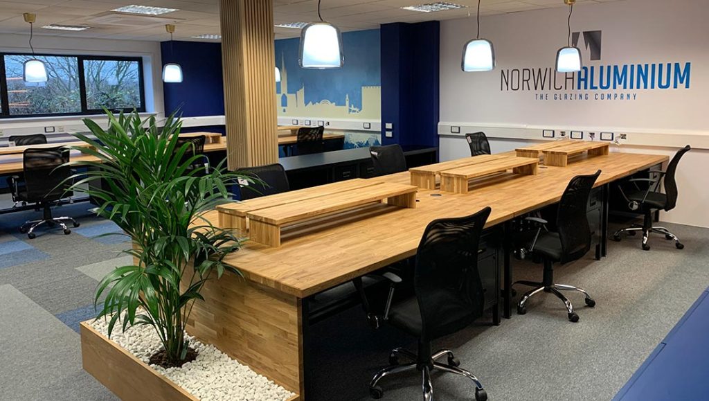 production bureau office space wooden desks